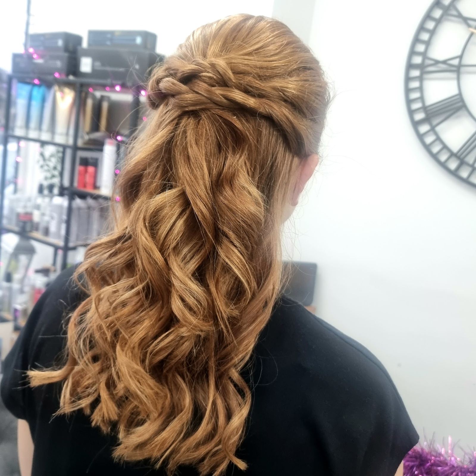 A half-up curled style at Helen Griffin Hair & Nails